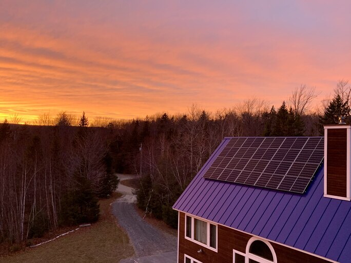 Catmount Solar installs a rooftop solar system at Vermont Compost Company