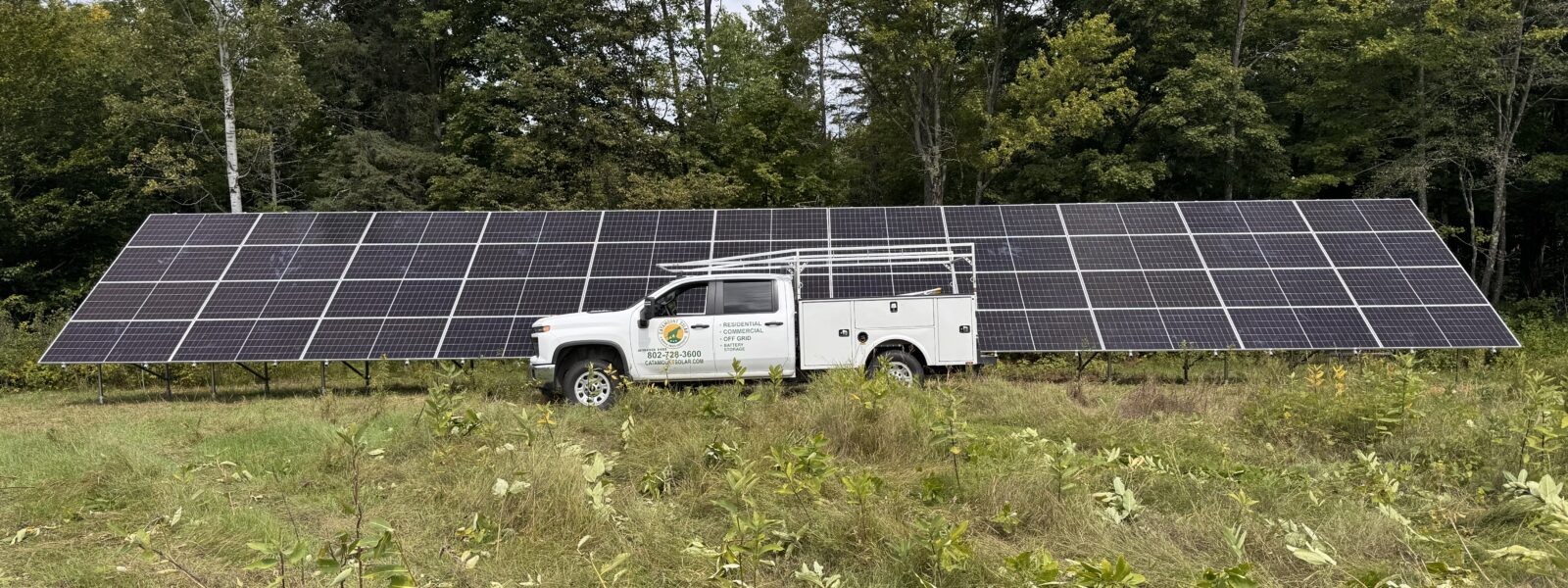 Ground solar panels with Catamount Solar service truck